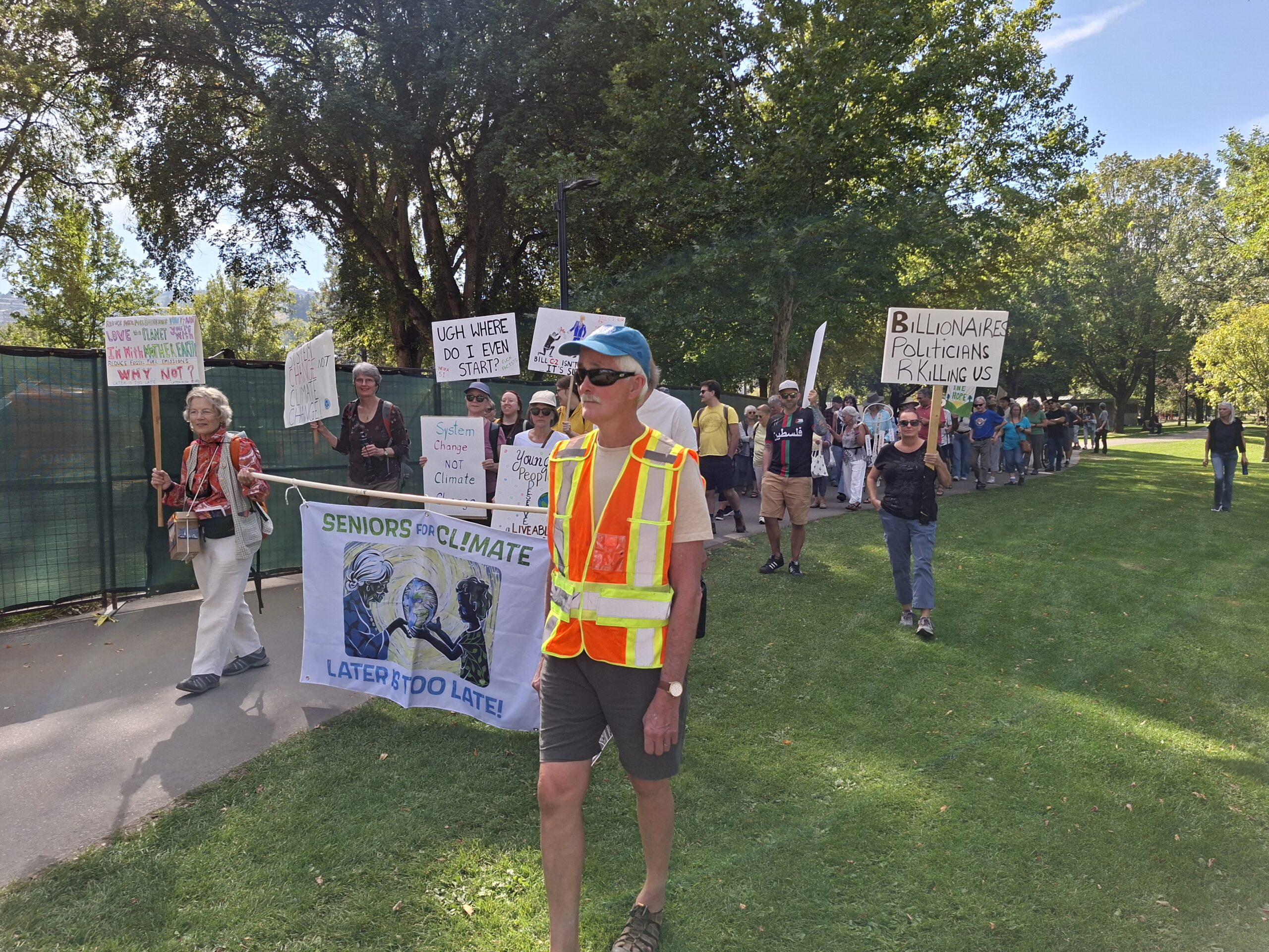 Picture of people marching and holding banners